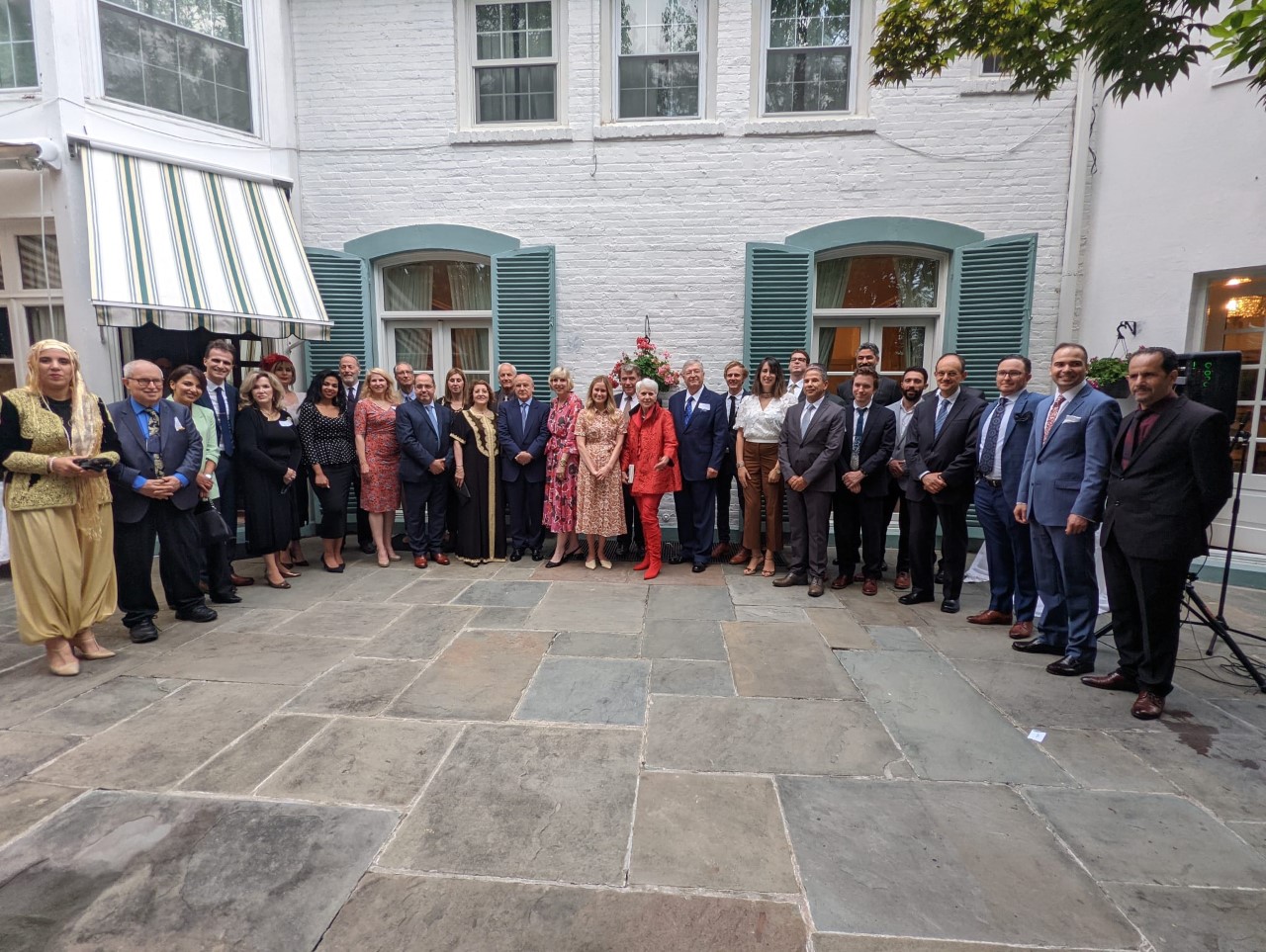 Club members and Algerian officials mingle at The Elms, the residence of Algerian Ambassador Ahmed Boutache and his wife, Fatima Boutache. 