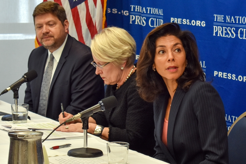 Immigration judge Ashley Tabaddor, right, answers a question from National Press Club president Alison Kojak.