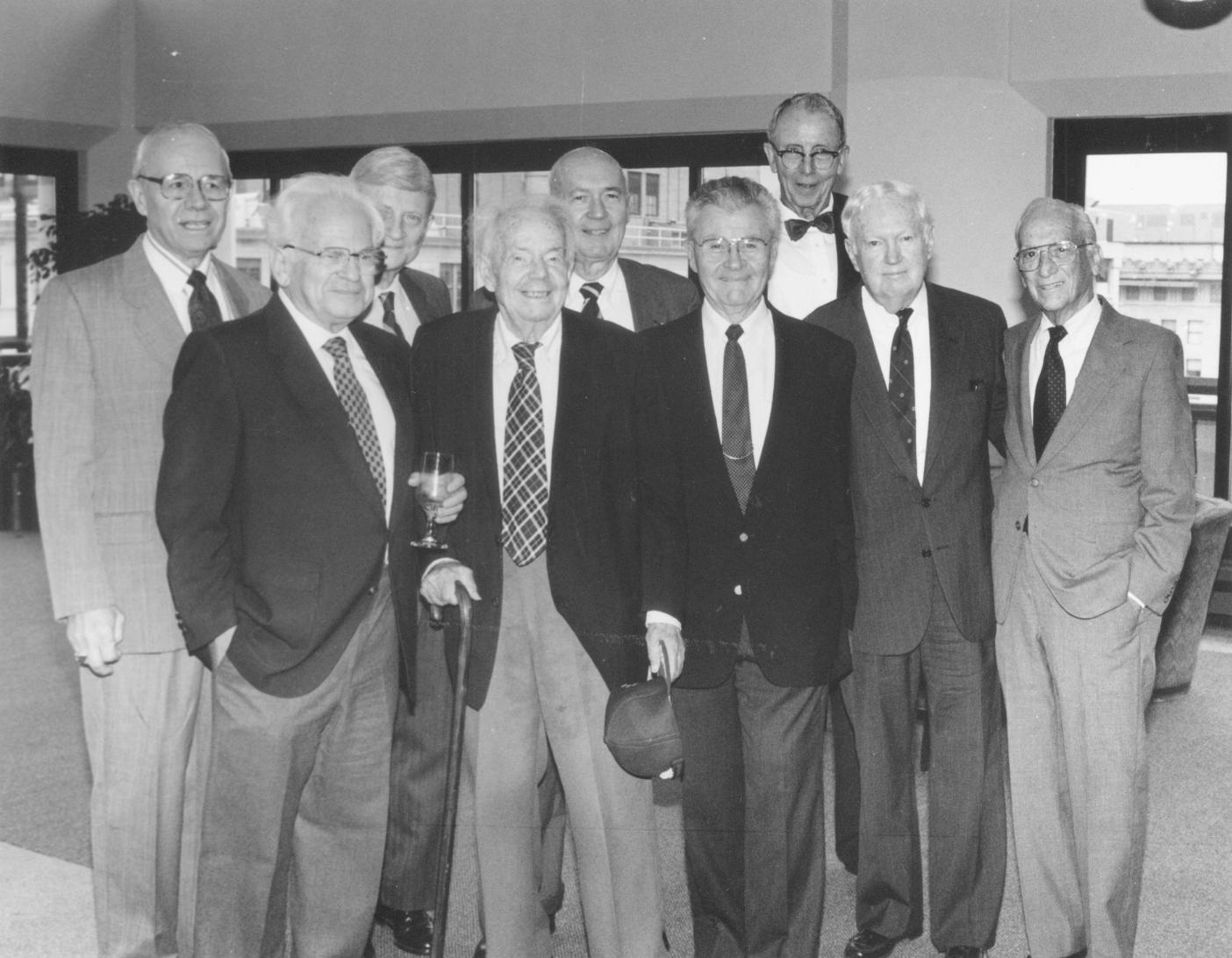 Left to right: Don Larrabee, Joe Laitin, John Harllee, Edgar Alan Poe, Ed Prina, Gen. Paul Tibbets, Frank Holeman, John Cosgrove, Shirley Povich.