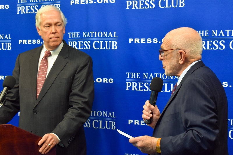 National Press Club president Mike Freedman asks a question of George Roberts Jr., president of NACCHO