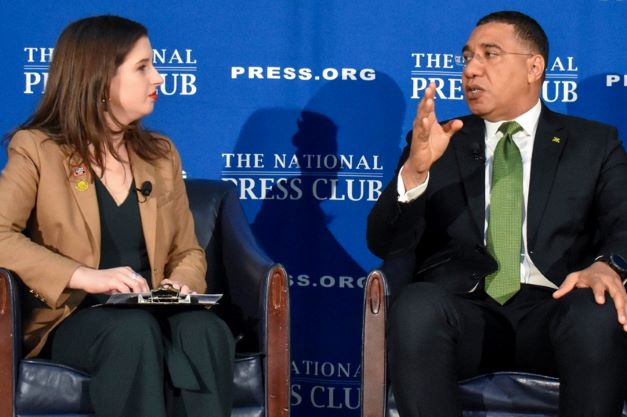 Photo of National Press Club Treasurer Emily Wilkins and Jamaican Prime Minister Andrew Holness